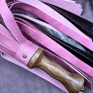 Heavy Pink and Mulberry leather flogger with walnut hand-turned handle.