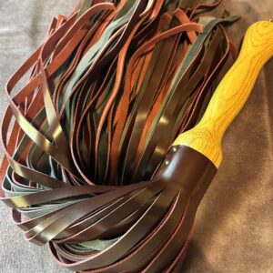 Heavy Ox Blood leather and grey waxed suede 106 falls flogger with reclaimed oak hand-turned handle.