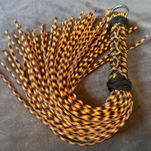 UV Lave Flow- UV Orange and Black Paracord Flogger