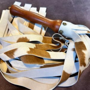 Brown and white hair-on calf skin flogger