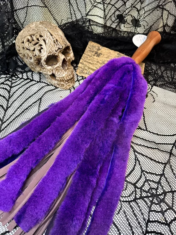 The Purple Beater double sided sheepskin and heavy leather flogger