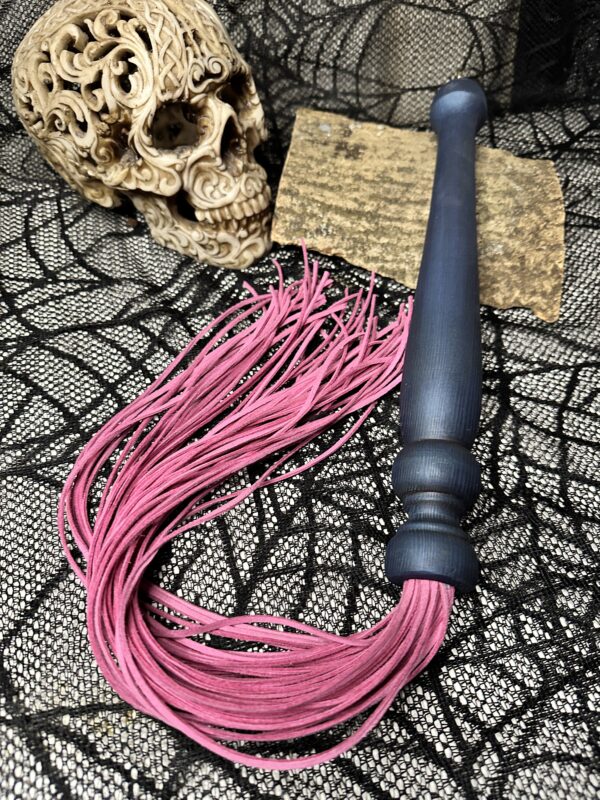 Pink faux suede flogger with blue handle