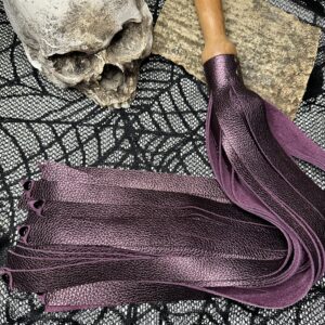 The Amethyst Love metallic purple leather flogger with hand turned handle