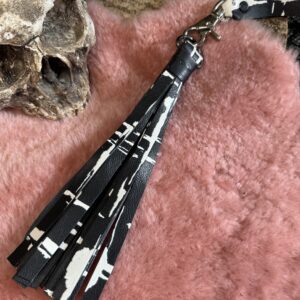 Black with white print calfskin pussy/dick flogger
