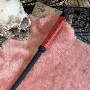 Rubber Whip with red leather wrapped handle and black stitching