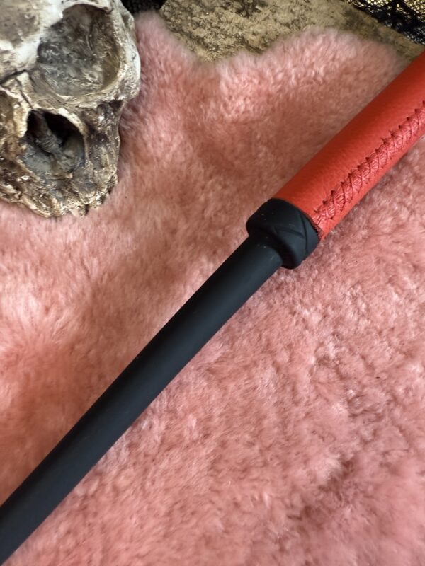Rubber Whip with red leather wrapped handle and red stitching - Image 4