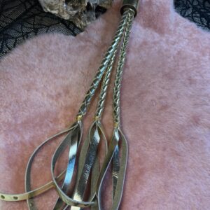 The Triple Whipped Gold flogger