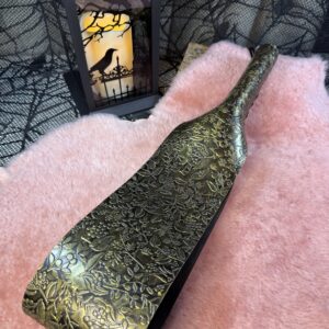 Black and Gold embossed leather belt-style paddle