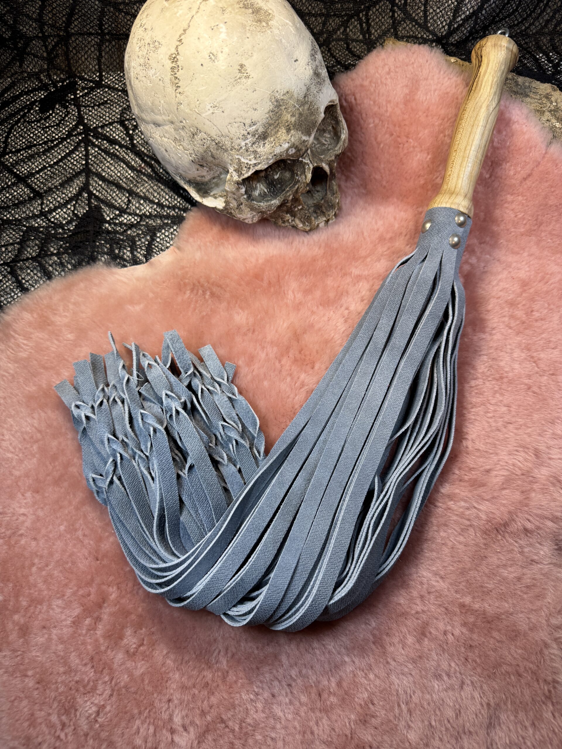 The Blue Threnody flogger with character handle