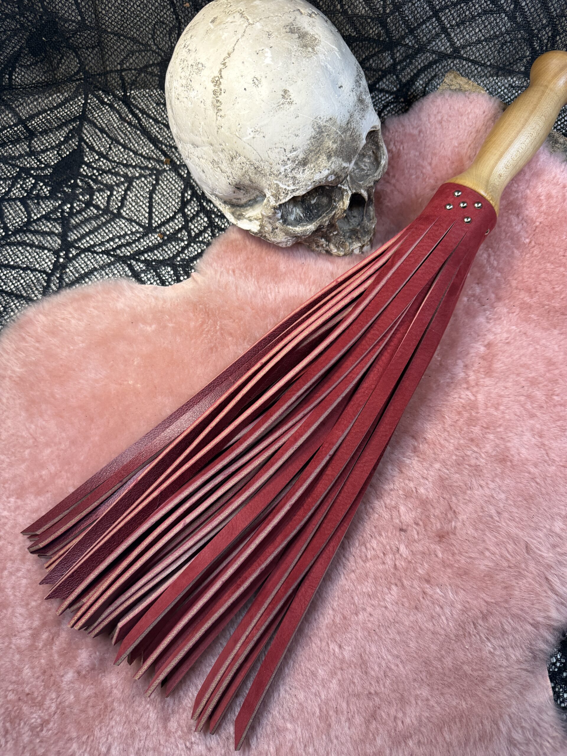 The Crimson Mercy flogger with character handle