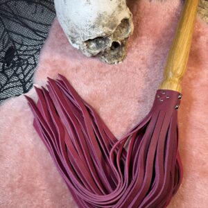 The Crimson Tempest flogger with hand turned handle