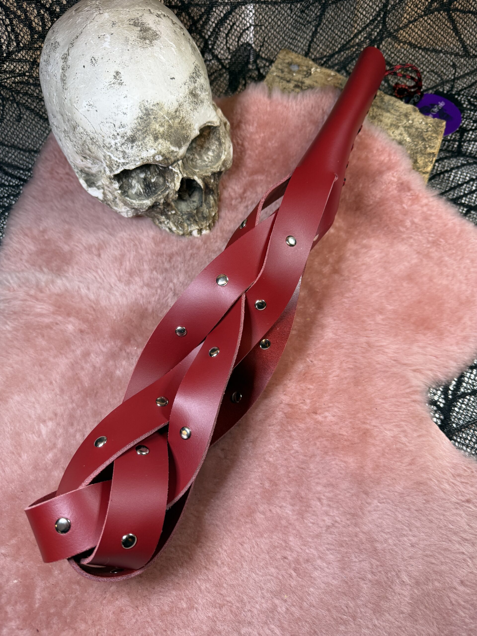 The Red Studded Braided Bum Beater